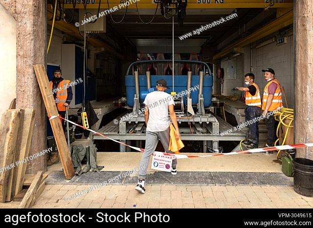 Illustration picture shows workers inspecting technical installations at the Walibi amusement park in Wavre, on Thursday 29 July 2021