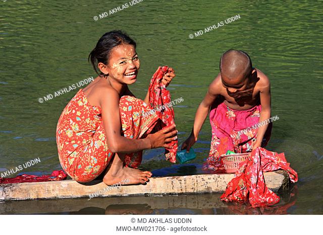 Little girls from ethnic community bathing in Sangu river Thanchi in Bandarban, Bangladesh December 2, 2009