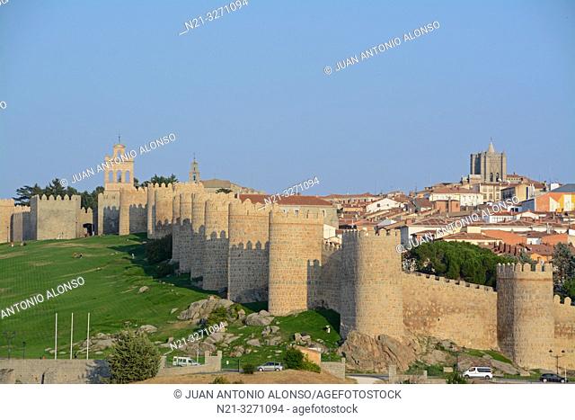 The Espadaña -bell gable- on the left and the Cathedral of Christ the Saviour on the right. The fortified city of Avila, Castilla-Leon, Spain, Europe