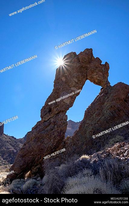 Queenƒ.s Shoe rock arch at El Teide National Park on sunny day, Tenerife, Canary Islands, Spain