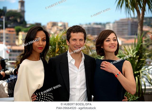 Director Guillaume Canet, actresses Zoe Saldana (l) and Marion Cotillard (r) attend the photocall of ""Blood Ties"" during the the 66th Cannes International...