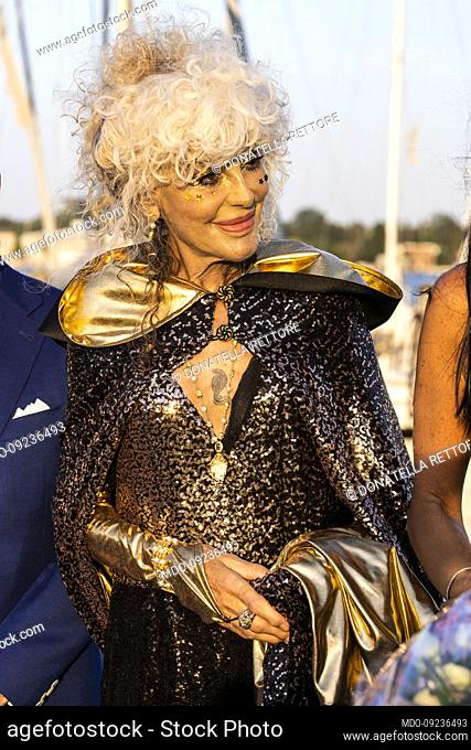 Italian singer Donatella Rettore at the Onda high fashion show on the wave of fashion designer Eleonora Lastrucci along the Darserna della Marina di Sant’Elena