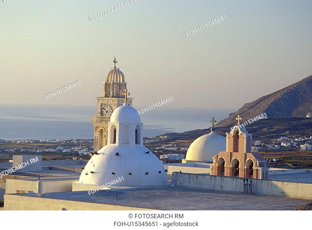 Santorini, Greek Islands, Fira, Cyclades, Greece, Europe, Scenic view of church steeples in the village of Fira on Santorini Island on the Aegean Sea
