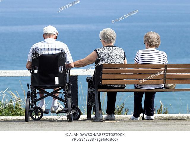 Elderly people on upper promenade at Saltburn by the Sea, North Yorkshire, England, United Kingdom