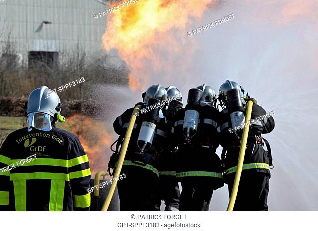 FIREFIGHTERS BATTLING A FIRE CAUSED BY A GAS LEAK, JOINT TRAINING OF GRDF FRENCH GAS COMPANY OPERATIVES AND FIREFIGHTERS