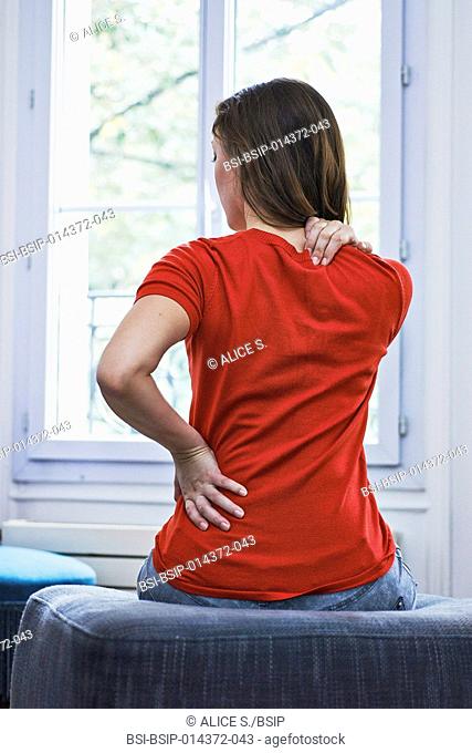 woman suffering from back pain