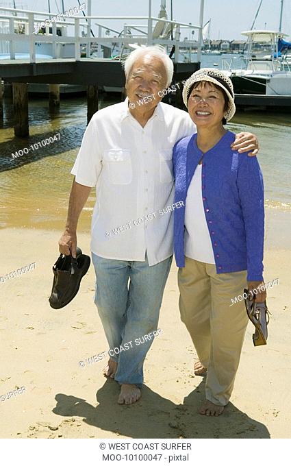 Senior couple on beach portrait