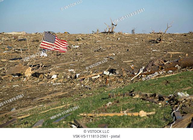 American flag in debris after tornado