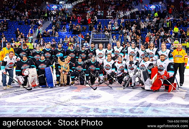 RUSSIA, ST PETERSBURG - DECEMBER 10, 2023: The Kharlamov Division's and the Tarasov Division's players pose for a group photograph after their final ice hockey...