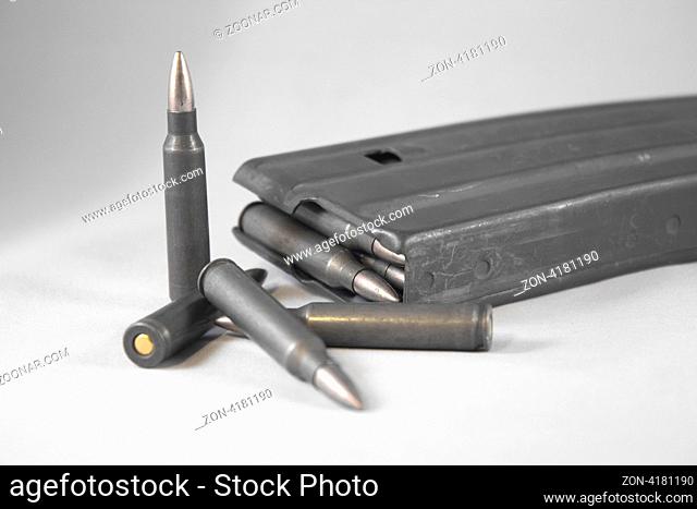 Assault Rifle gun clip with .223 ammo bullets isolated on white