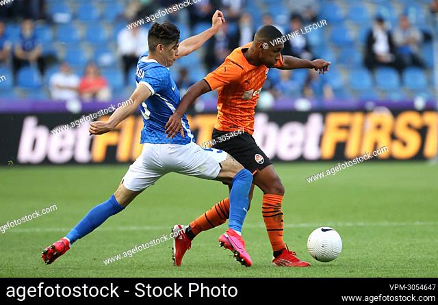 Genk's Gerardo Arteaga and Shakhtar's Tete fight for the ball during a game between Belgian soccer team KRC Genk and Ukraine's club Shakhtar Donetsk