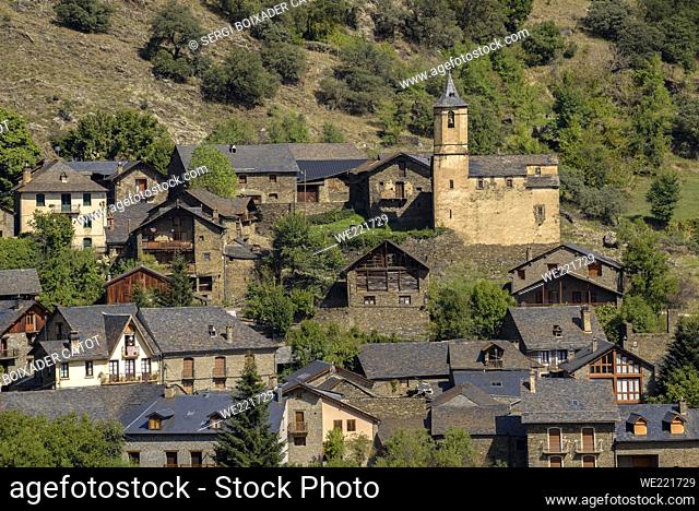 Village of Lladrós in the Cardós valley, with green and spring-like surroundings at the end of summer (Pallars SobirÃ , Lleida, Catalonia, Spain, Pyrenees)