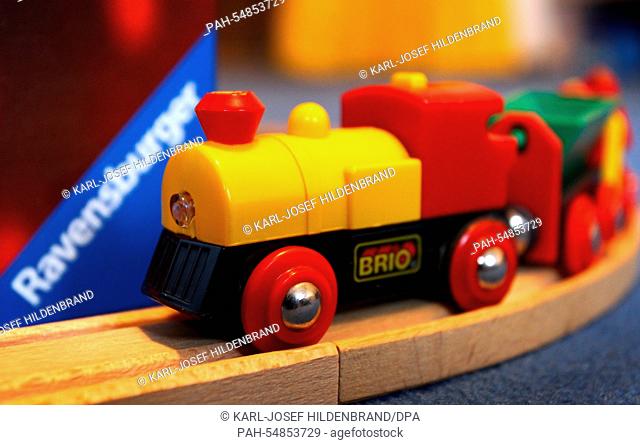 A BRIO train placed in front of the logo of the game manufacturer Ravensburger in Kaufbeuren,  Germany, 08 January 2015. Ravensburger has acquired the Swedish...