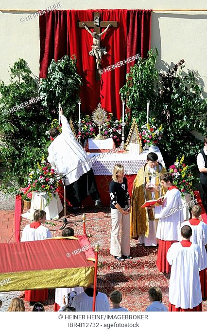 Altar next to a street during the Corpus Christi procession, Muehldorf am Inn, Upper Bavaria, Germany, Europe
