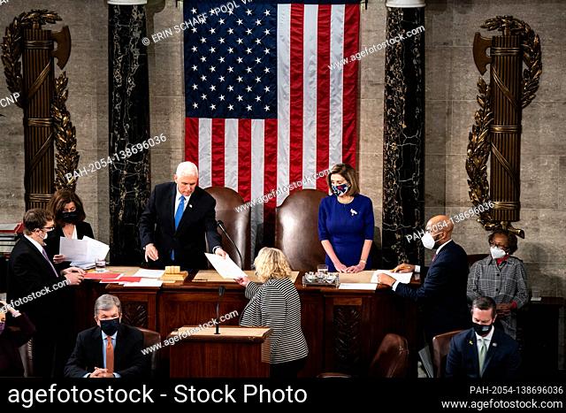 House Speaker Nancy Pelosi and Vice President Mike Pence preside over a Joint session of Congress to certify the 2020 Electoral College results on Capitol Hill...
