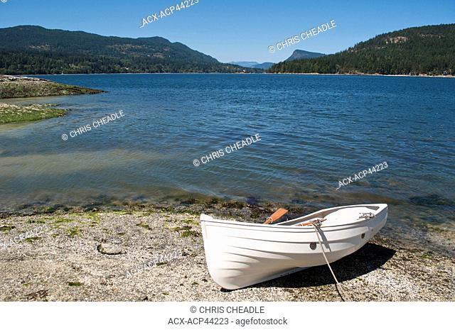 Dinghy on Russell Island with view to Fulford Harbour, Saltspring Island, British Columbia, Canada