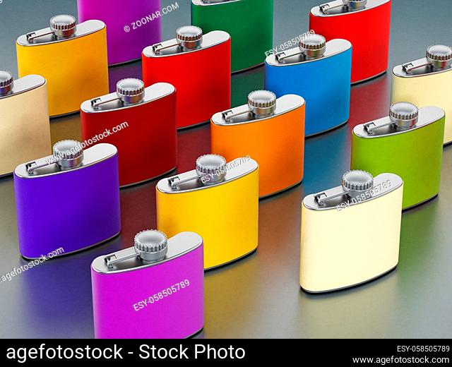 Hip flasks stack on gray surface
