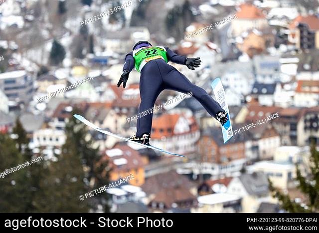 23 January 2022, Baden-Wuerttemberg, Titisee-Neustadt: Nordic skiing/ski jumping: World Cup, large hill, men, training: Germany's Philipp Raimund jumps on the...