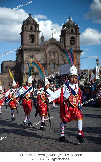 Children marching in the Plaza Mayor. Peru