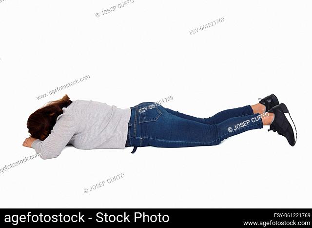 rear view of a woman lying on the floor face down on white background