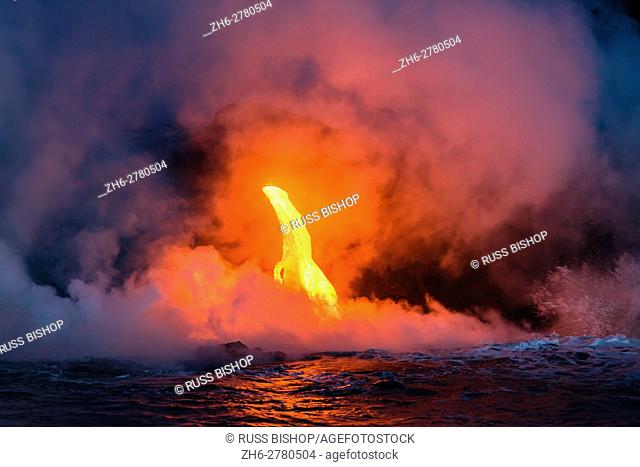 Lava flow entering the ocean at dawn, Hawaii Volcanoes National Park, The Big Island, Hawaii USA