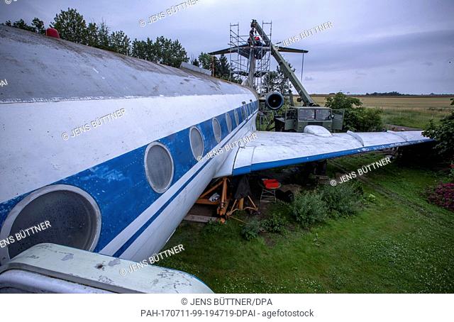 Cottbus Aviation Museum specialists prepare a Soviet Tupolev 134A passenger plane for dismantlement in Gruenz, Germany, 10 July 2017