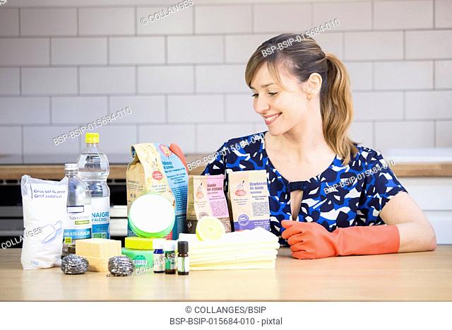 Woman using eco cleaning products