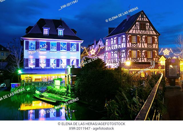 Christmas decoration by night at the Little Venice. Colmar. Wine route. Haut-Rhin. Alsace. France