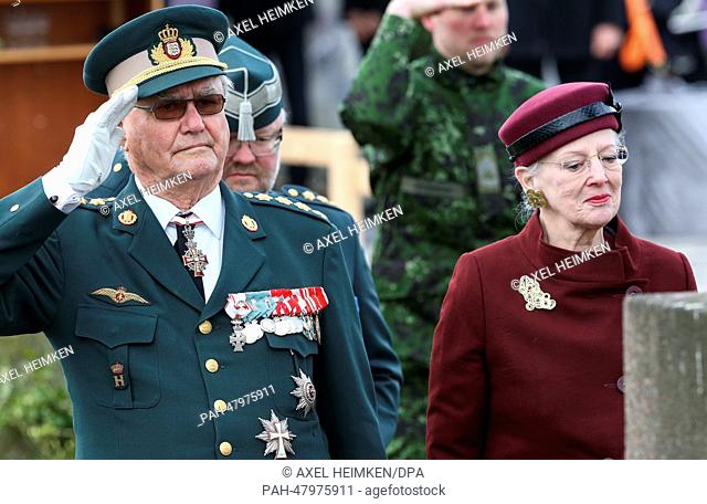 Danish Queen Margrethe II and her husband Prince Henrik take part in the ceremony to mark the 150th anniversary of the Battle of Dybbol in Sonderborg, Denmark