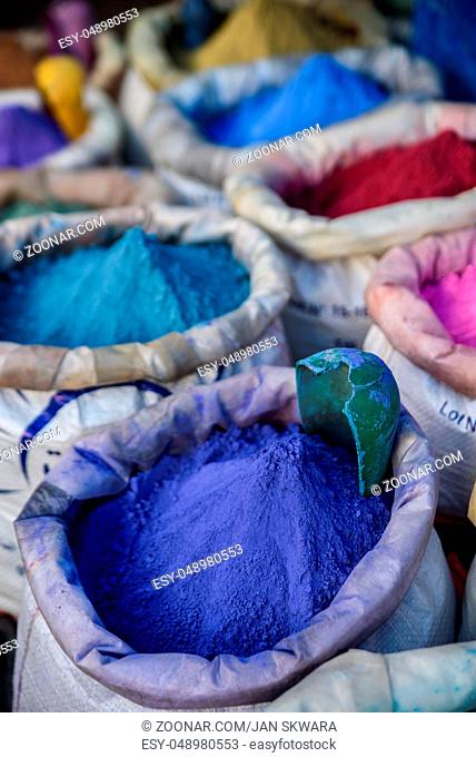 Bags with colourful powder for paint, Chefchaouen. Morocco