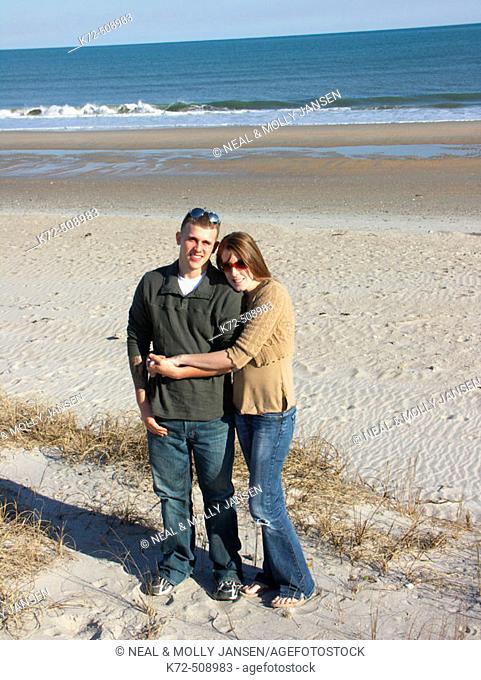Young Couple on Beach in North Carolina, USA