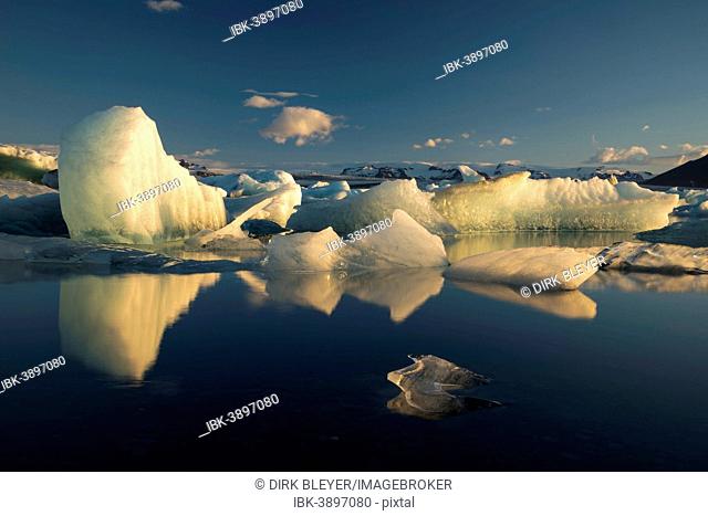 Icebergs reflected in Jökulsárlón Glacier Lagoon, Vatnajökull Glacier, Austurland, East Iceland, Iceland