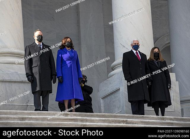 Vice President Kamala Harris, second from left and Second Gentleman Douglas Emhoff, left, send-off former Vice President Mike Pence, second from right