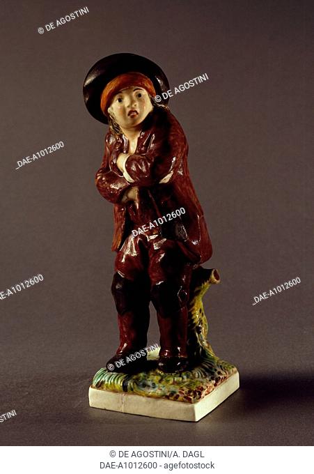 Figure of a chimney sweep, ca 1780-1785, polychrome hard porcelain, height 17 cm, Vinovo manufacture, Piedmont. Italy, 18th century