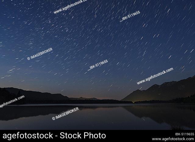 European Starling trails at the Barmasee, Startrails, view to the south, Bavaria, Germany, Europe