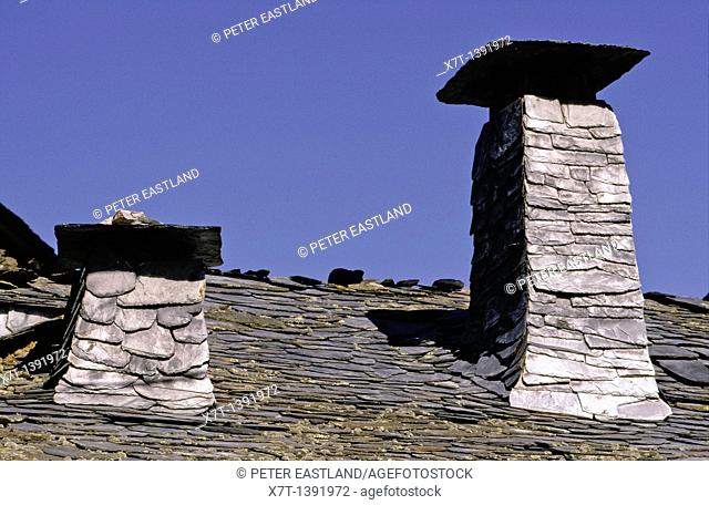 A slate roof and chimneys, in the Sierra de Ancares at Pereda de Ancares, north of Villafranca del Bierzo, Leon province, Northern Spain