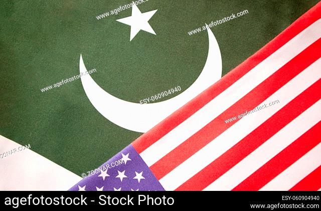 Concept of Bilateral relationship between two countries showing with two flags: United States of America and Pakistan