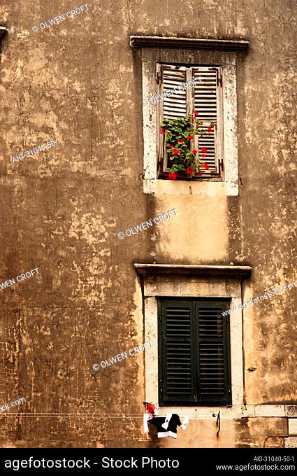 Shuttered windows with flowers, Dubrovnik, Croatia