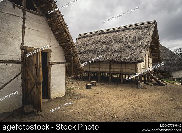 Carolingian period. Hypothetical reenactment of customs and traditions in a Frank village (9th- half 10th Century). Overall view of the houses of the...