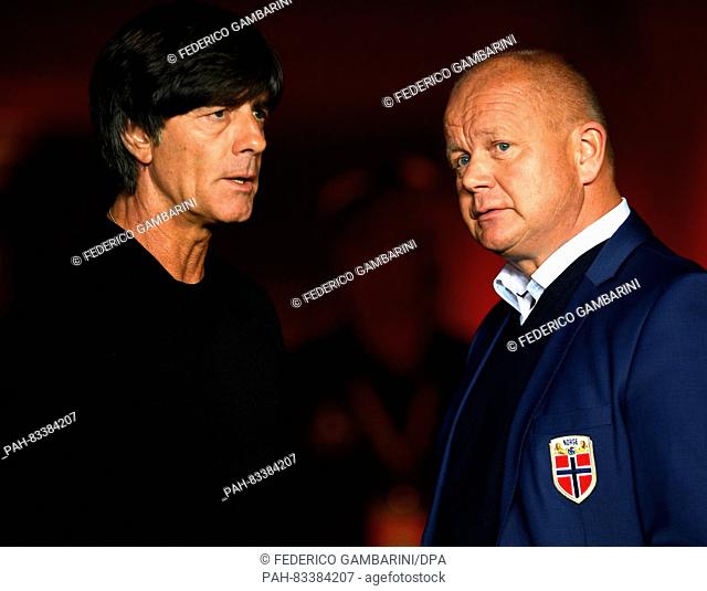 Head coach Joachim Loew (L) of Germany and head coach Per-Mathias Hogmo of Norway during the FIFA World Cup Qualifiers Europe Group C soccer match between...