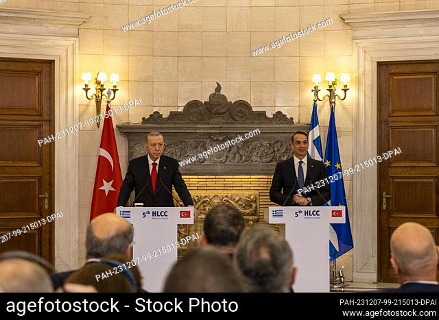 07 December 2023, Greece, Athen: Turkish President Recep Tayyip Erdogan (l) and Greek Prime Minister Kyriakos Mitsotakis hold a joint press conference after...