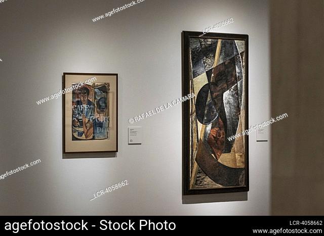 THE ARTIST ANATOL PETRYTSKYI WITH CONSTRUCTIVIST COMPOSITION AND PORTRAIT OF MYKHAILO SEMENKO AT EXHIBITION ""IN THE EYE OF THE HURRICANE""
