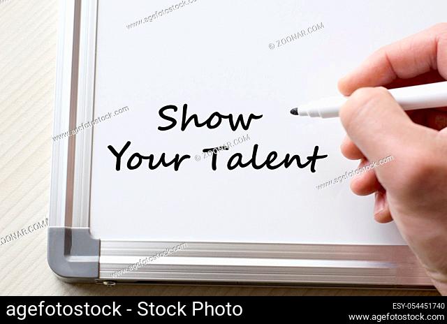 Human hand writing show your talent on whiteboard