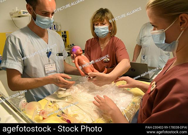 PRODUCTION - 17 March 2023, Saxony, Leipzig: On the neonatology ward of the University Hospital (UKL), health and pediatric nurse Lisa König