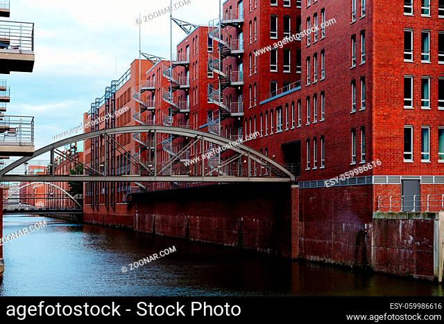 Brick buildings in the Warehouse District or Speicherstadt. Wandrahmsfleet canal. UNESCO World Heritage Site