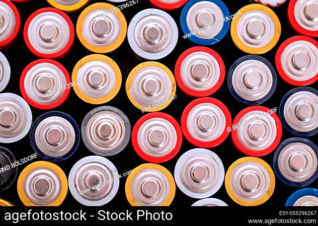 ots of different batteries in a heap
