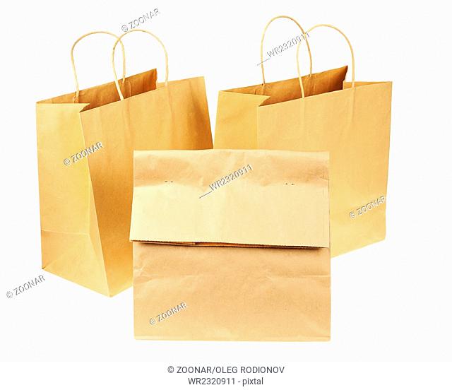 Empty brown recycled paper shopping bags isolated on white background