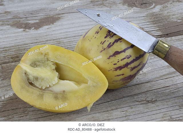 Melon Pears and knife Solanum muricatum Pepino Dulce Melon Shrub