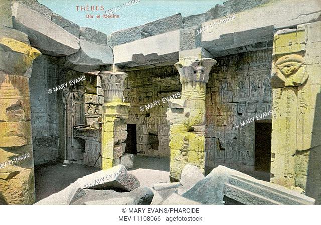 Inside the temple of Hathor, Ancient Egyptian goddess of motherhood, in Deir el-Medina near Luxor (Thebes), Egypt. Deir el-Medina was a village inhabited by...