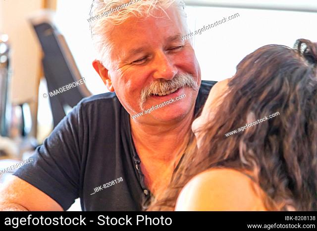 Middle-Aged couple enjoying A tender moment